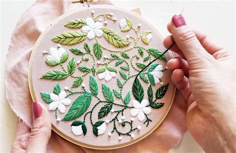 What do you do with embroidery when finished, and how does it relate to the art of storytelling?